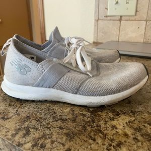 Women’s white and gray NB athletic shoes